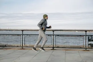 Senior person running