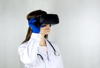 Doctor with VR goggles